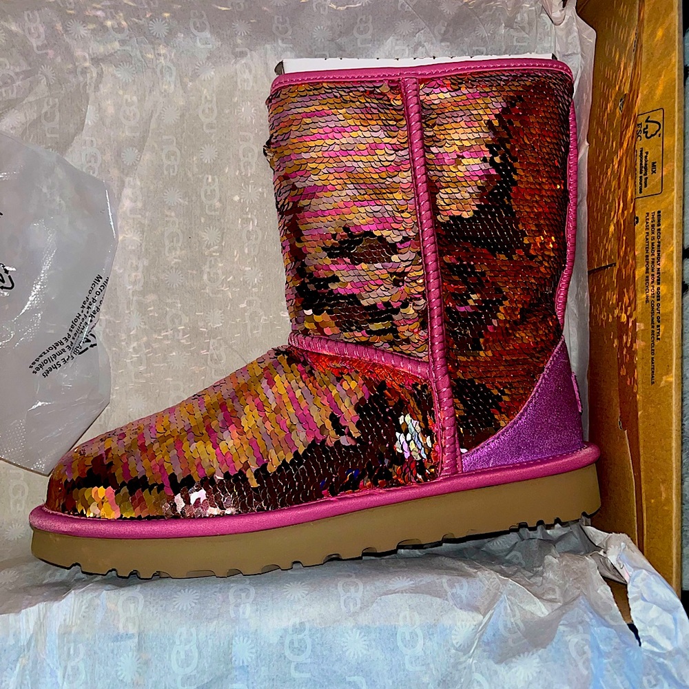 Brand New Uggs never worn and you can flip the pink up and it turns to gold